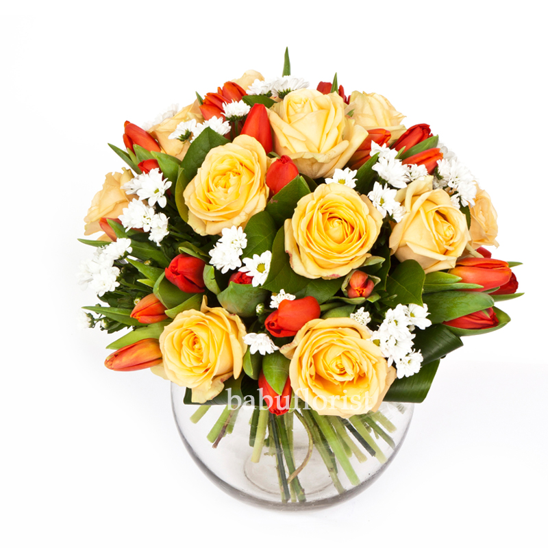 Yellow Roses And Red Tulips in Vase Isolated