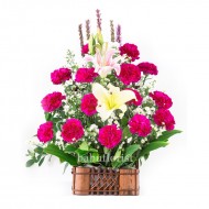 Basket Of Carnation And Lily Isolated